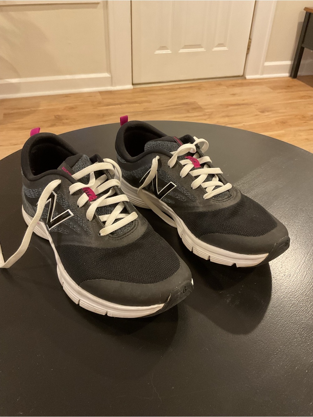 New Balance 713Women's Black Athletic Sneakers with White Soles and Pink Accents